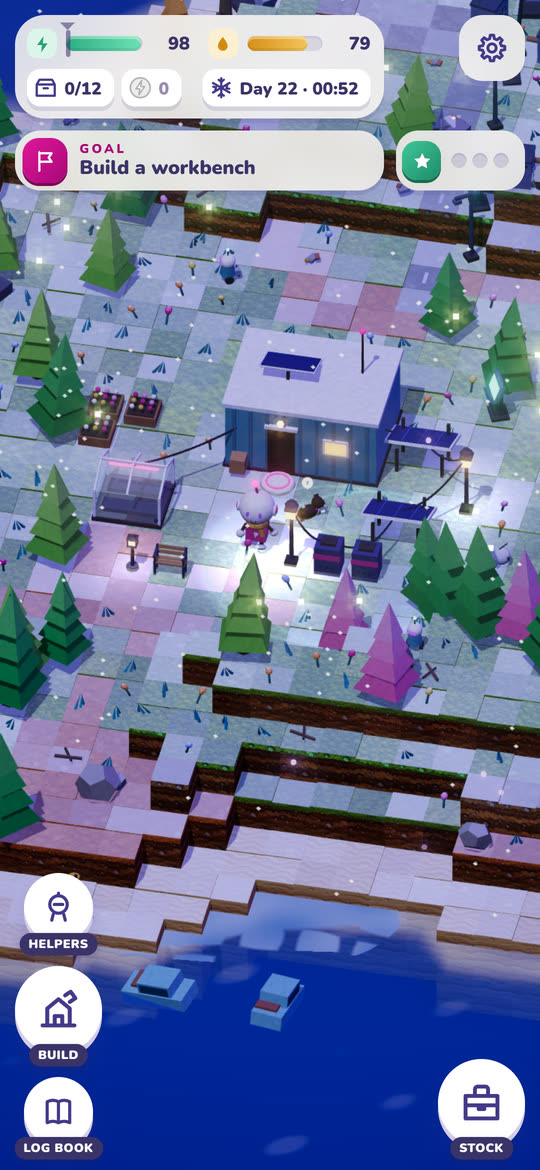 The home island in Alone on a winter night, with snow on the ground and the lanterns lit.