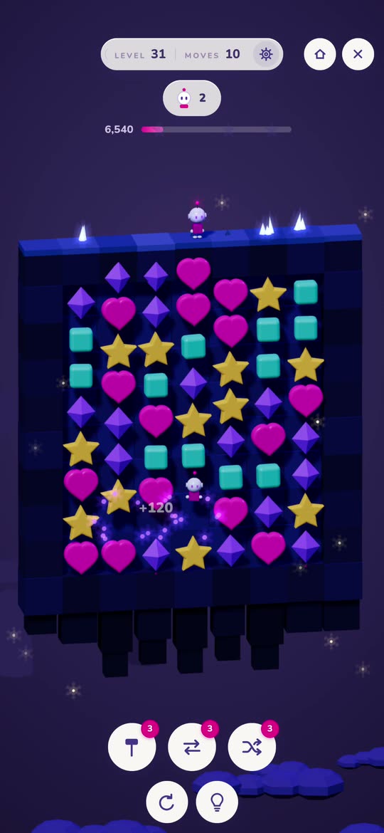 A SWAP level in the starry night: a board of sweets on a dark blue island, with a little robot riding down among them.